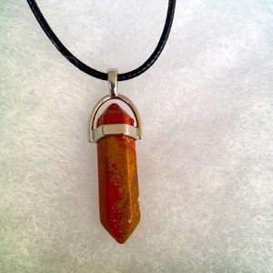 Coral pendant on black cord necklace 16-18”